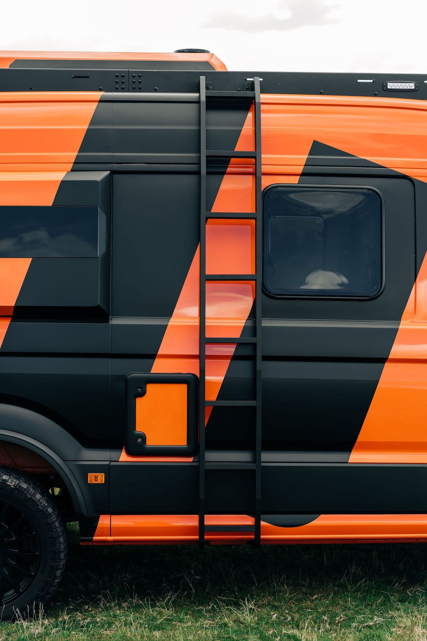 Explorer aluminium side ladder mounted to the van flank